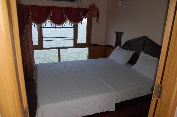 Sleeping cabin backwater boat on South India vacation