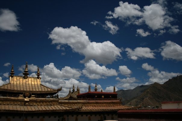 Tibet clouds and rooftop  - Jessika Pilkes