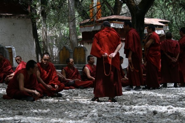 Tibet Monks in Garden -  Jessika Pilkes