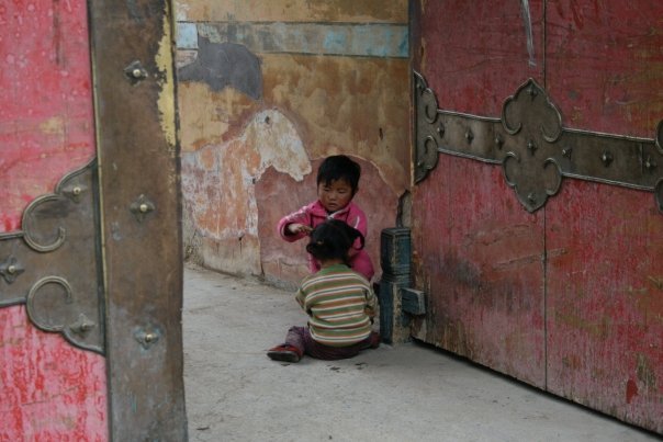 Tibet - Children by Colorful doors  - Jessika Pilkes